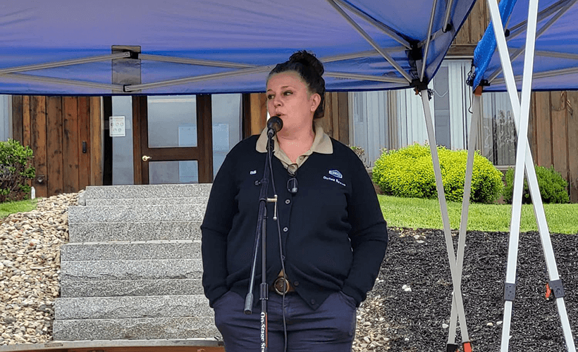 Log Supplier Day - outdoor announcement at microphone