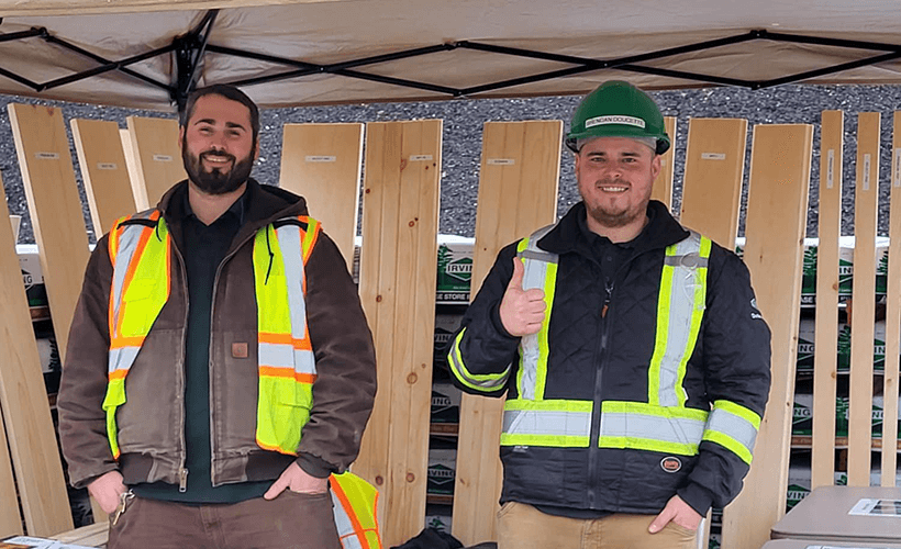 Smiling staff members posing for a photo
